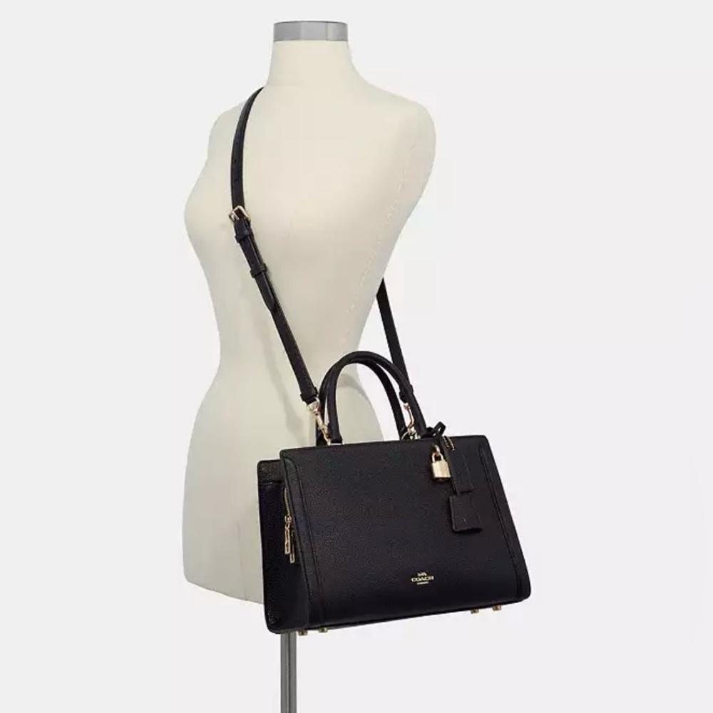Coach “Zoe Carryall” Bag with Gold Hardware